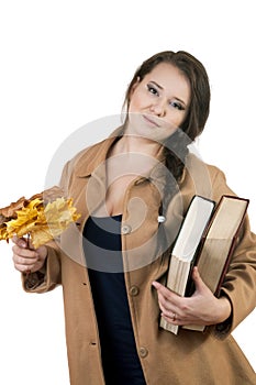 Plus size woman with thick volumes of books on a white