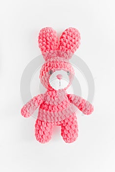 Plush pink rabbit on white background. Concept toys for children.games.girl.hobby. Easter Bunny. Easter Hare. Isolated