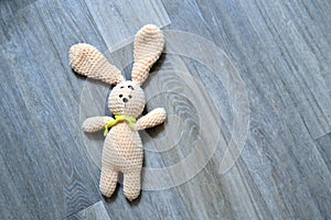 Plush rabbit cute toy animal bunny on background. Fluffy soft baby doll little object