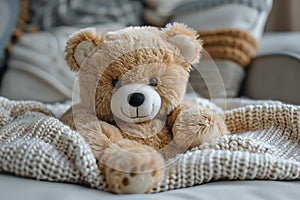 A plush teddy bear sits on soft linens in a cozy wood bed
