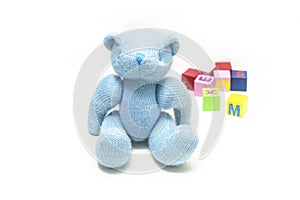 Plush teddy bears, stethoscopes and building blocks on the floor, symbolizing children`s health, medical and health care concept p