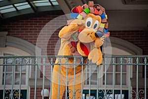 Pluto waving from the balcony at Walt Disney World Railroad in Halloween season at Magic Kingdom 5