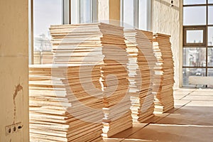 Plywood boards on the industry. layer of plywood, Construction site preparation for the flooring of the parquet floor