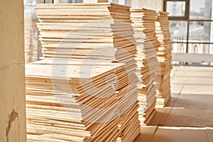 Plywood boards on the industry. layer of plywood, Construction site preparation for the flooring of the parquet floor
