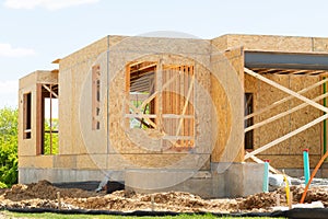 plywood walls of a new house development truss unfinished framework