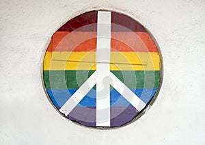 Plywood window protection with gay pride colors and peace sign on the side of JR`s Bar and Grill on Cedar Springs Rd., Dallas