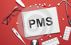 The pms medical supplies on a notebook on a medical theme. Doctor's workplace