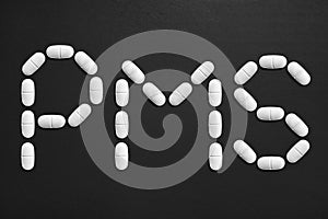 PMS text made from pills. photo