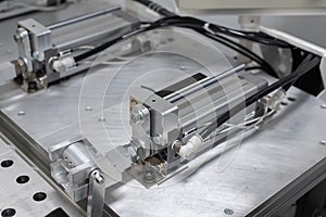 Pneumatic cylinder setup on machine photo