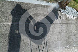 Pneumatic hammer destroing a wall