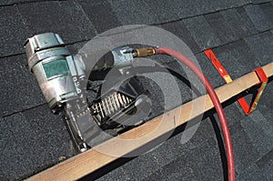 Pneumatic roofing nail gun photo
