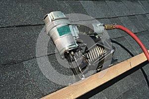 Pneumatic roofing nail gun photo