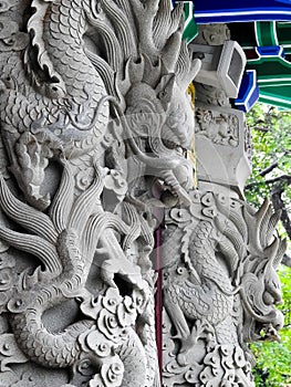 Po Lin monastery stone dragon carved pilars. photo