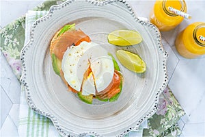 Poached egg, salmon and avocado sandwich