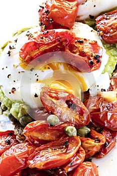 Poached Egg on Toast with Avocado Roasted Cherry Tomatoes and Capers