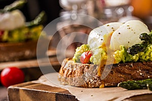 Poached eggs with avocado and asparagus