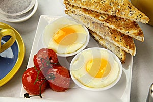 Poached Eggs And Tomatoes