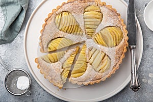 Poached pear and almond frangipane tart