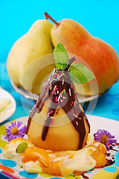 Poached pear with chocolate for child