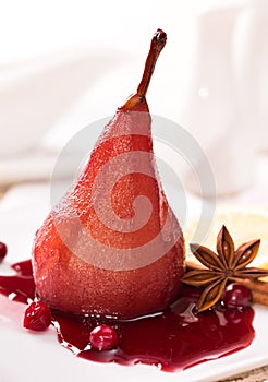 Poached pear with red wine sauce