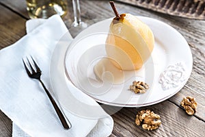 Poached pear in white wine