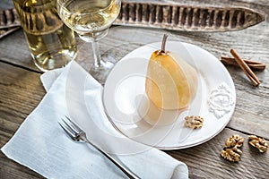 Poached pear in white wine