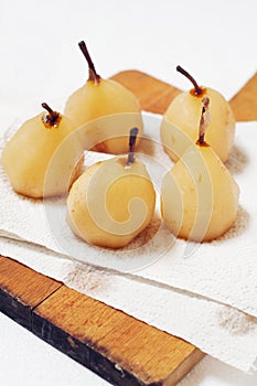 Poached pears in rose syrup