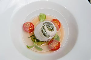 Poached sea bass and spinach roulade