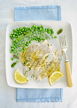 Poached sole with minty peas