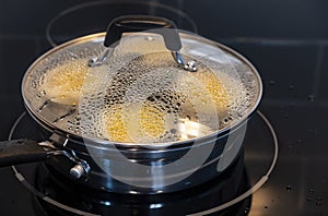 Poaching Four Eggs for Breakfast in an Egg-Poaching Pan #3 photo