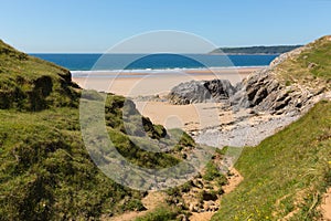 Pobbles beach The Gower Peninsula Wales uk popular tourist destination and next to Three Cliffs Bay in summer