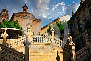 Poble Espanyol staircase leading to the Cathedral of Santiago in the city of Santiago de Compostela in Galicia, against the tower photo