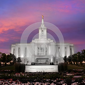 Pocatello LDS Mormon Latter-Day Saint Temple at Sunset with Glowing Lights