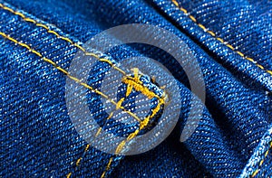 Pocket of blue hipster jeans material. Denim Cloth texture background