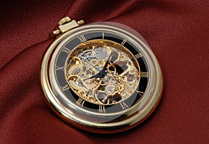 Pocket clock in gold