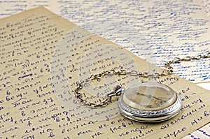 Pocket clock and old letters