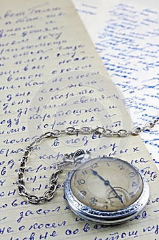 Pocket clock and old letters