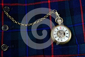 Pocket Watch and Chain on a Scottish Tartan Waistcoat Closeup