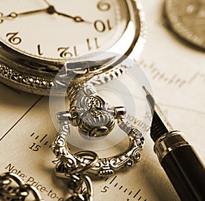 Pocket watch and fountain pen