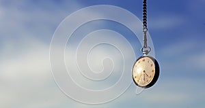 Pocket watch hanging from sky