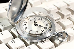 Pocket watch on the keyboard