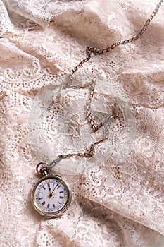 Pocket watch on lace