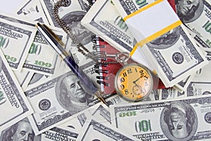 Pocket watch, notebook and pen