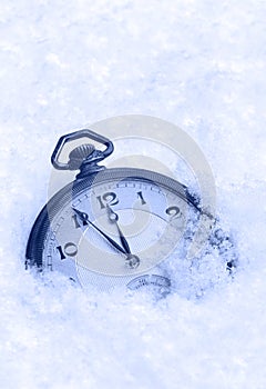 Pocket watch in snow, Happy New Year greeting card