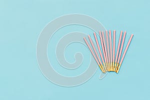 Pocky biscuits isolated on blue background