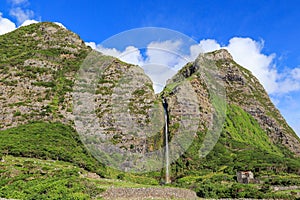 Poco do Bacalhau Waterfall - It falls from a height of about 90 metres, Flores, Azores, Portugal