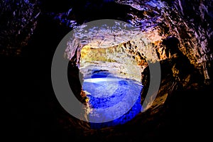 Poco Encantado, blue lagoon with sunrays inside a cavern in the Chapada Diamantina, Andarai, Bahia, Brazil photo