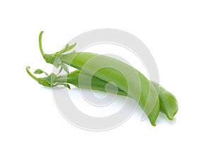 Pod of green peas isolated on the white background