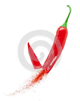 Pod of red pepper with chilly powder on white background
