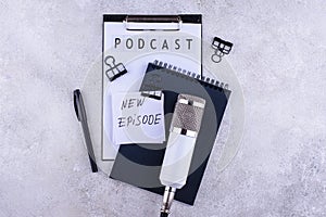 Podcast new episode concept with microphone